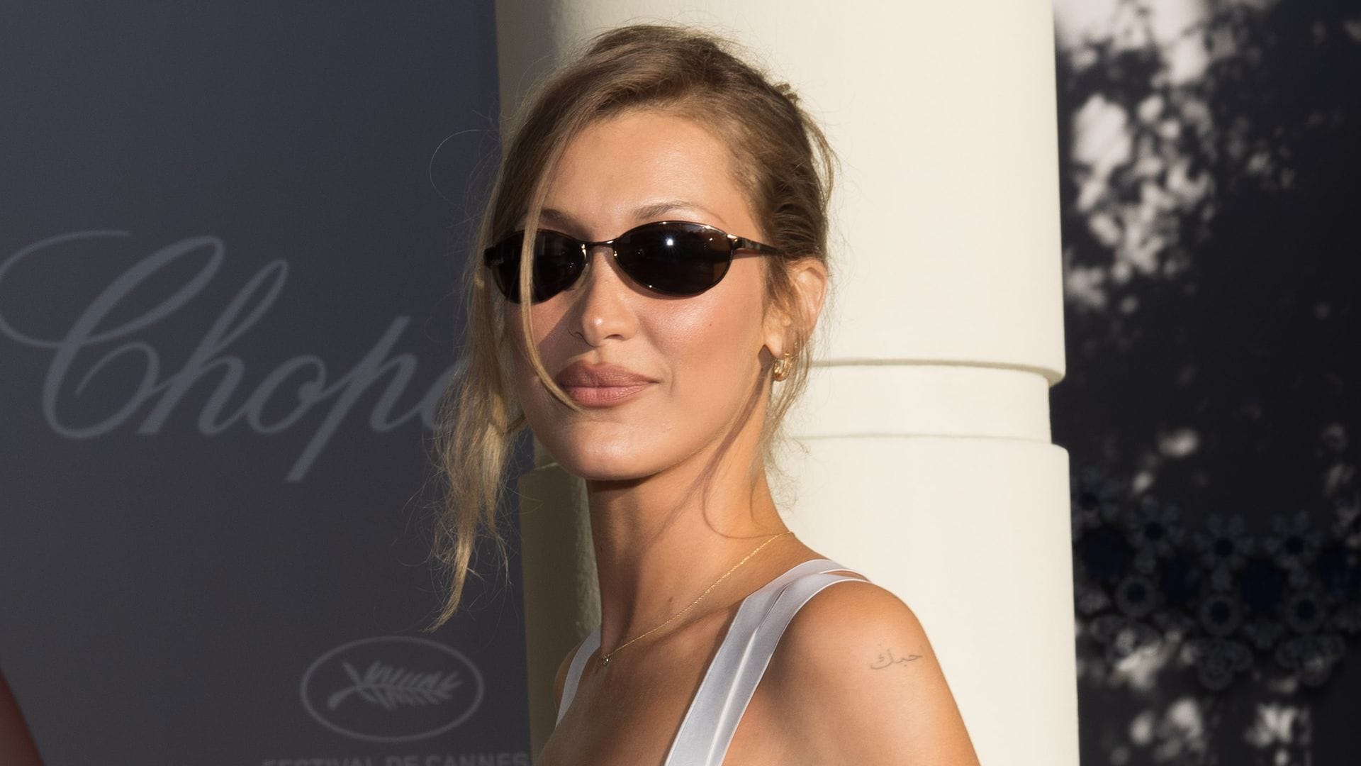 Bella Hadid's butter yellow skirt and blonde hair scream summer chic