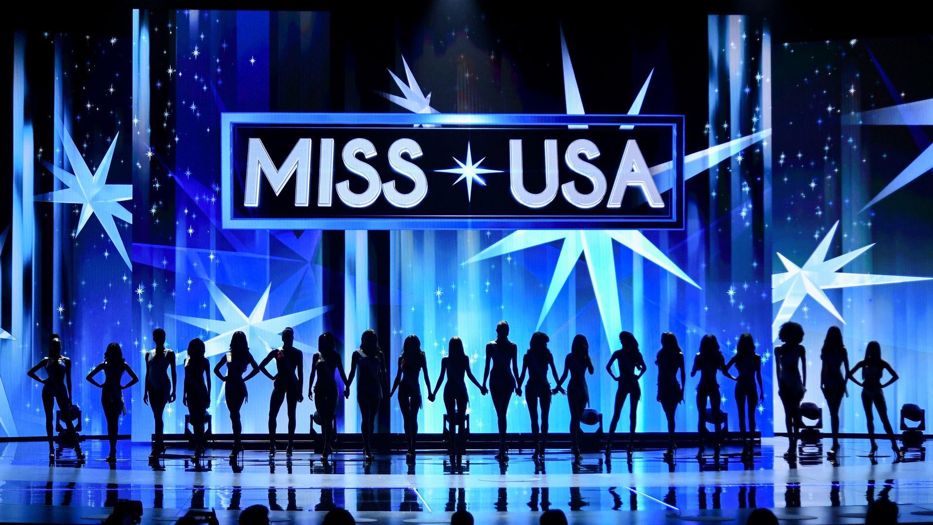 The Miss USA 2024 delegates pose onstage during the 73rd annual Miss USA Pageant