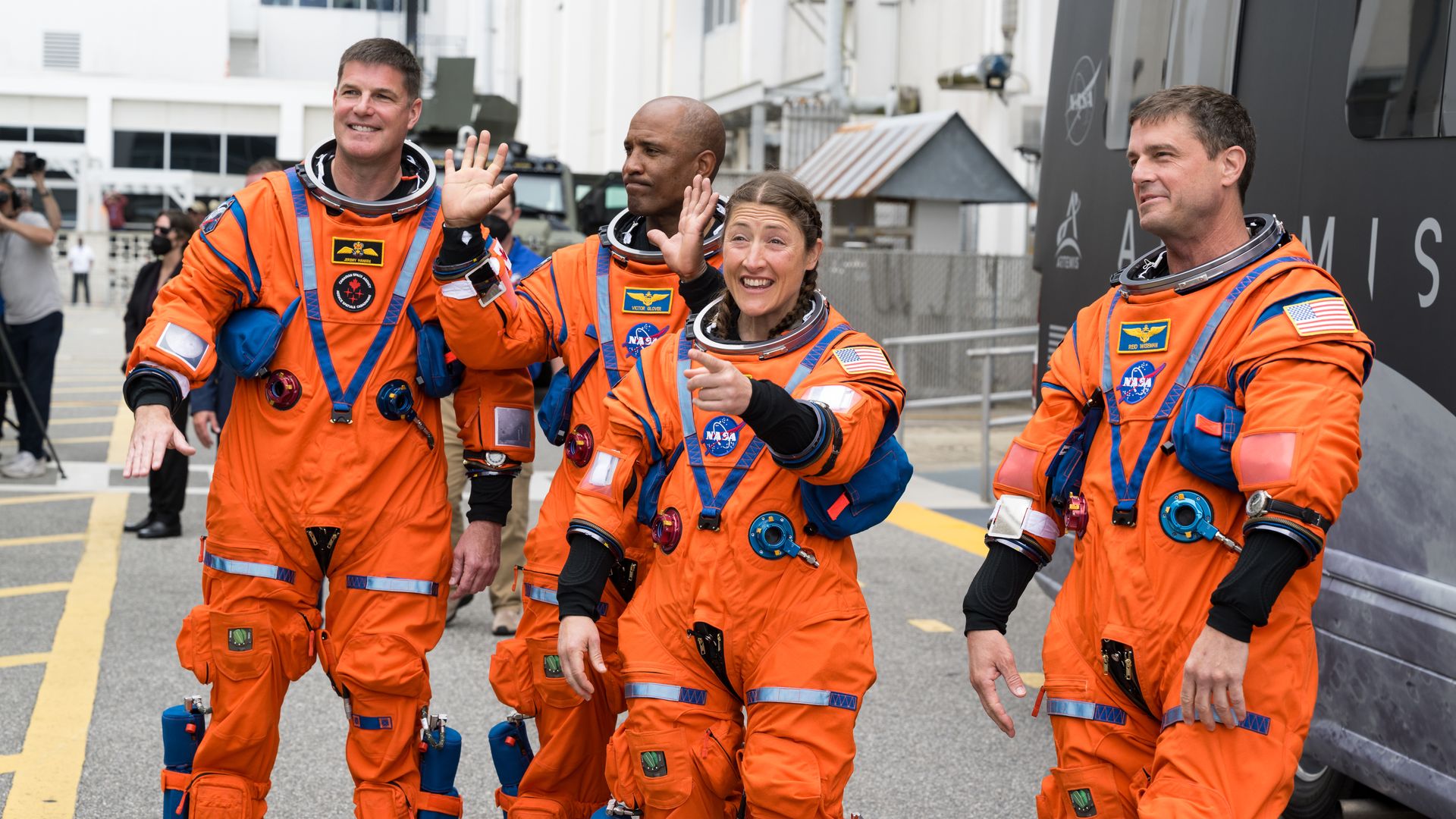  From right to left, NASA astronauts Reid Wiseman, commander; Christina Koch, mission specialist; Victor Glover, pilot; and CSA (Canadian Space Agency) astronaut Jeremy Hansen, mission specialist wave to family and friends as they prepare to depart.