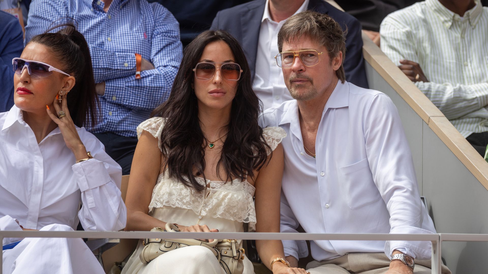 Brad Pitt and Ines de Ramon watching Mirra Andreeva during her match against Maja Chwalinska of Poland in the Women's Singles Final on Court Philippe Chatrier at the 2026 French Open Tennis Tournament at Roland Garros on June 6th, 2026, in Paris, France. (Photo by Tim Clayton/Getty Images)