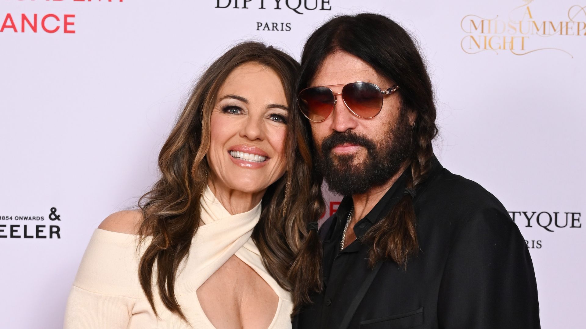 Elizabeth Hurley and Billy Ray Cyrus enjoy a 'magical' and PDA filled getaway to Scotland