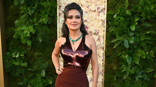 Salma Hayek Embraces Her Gray Hair and Bold Fashion on the 2025 Golden Globes Red Carpet