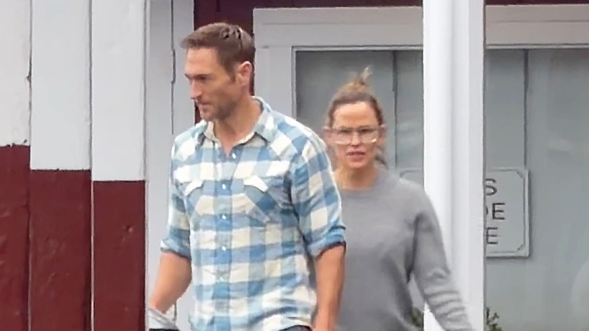 Jennifer Garner and John Miller share a romantic embrace during a rainy Labor Day weekend outing in Brentwood, offering a rare glimpse at the couple