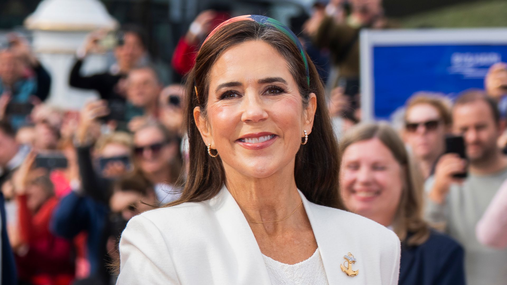 Queen Mary steps out in a classic print with an unexpected glamorous twist
