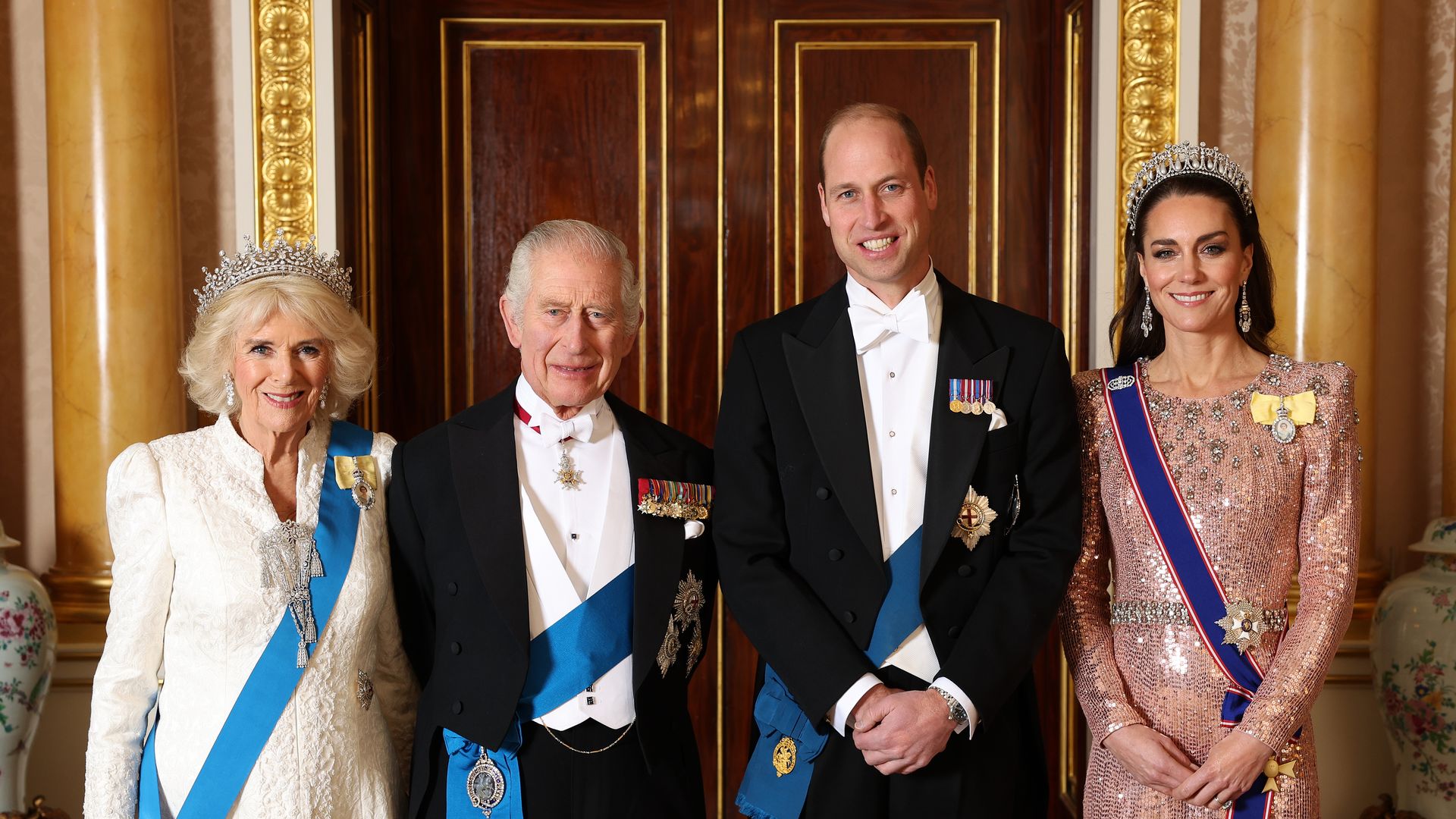 LONDON, ENGLAND - DECEMBER 05: (EDITORIAL USE ON (L-R) Queen Camilla, King Charles III, Prince William, Prince of Wales and Catherine, Princess of Wales pose for a photograph ahead of The Diplomatic Reception in the 1844 Room at Buckingham Palace on December 05, 2023 in London, England. (Photo by Chris Jackson/Getty Images For Buckingham Palace)