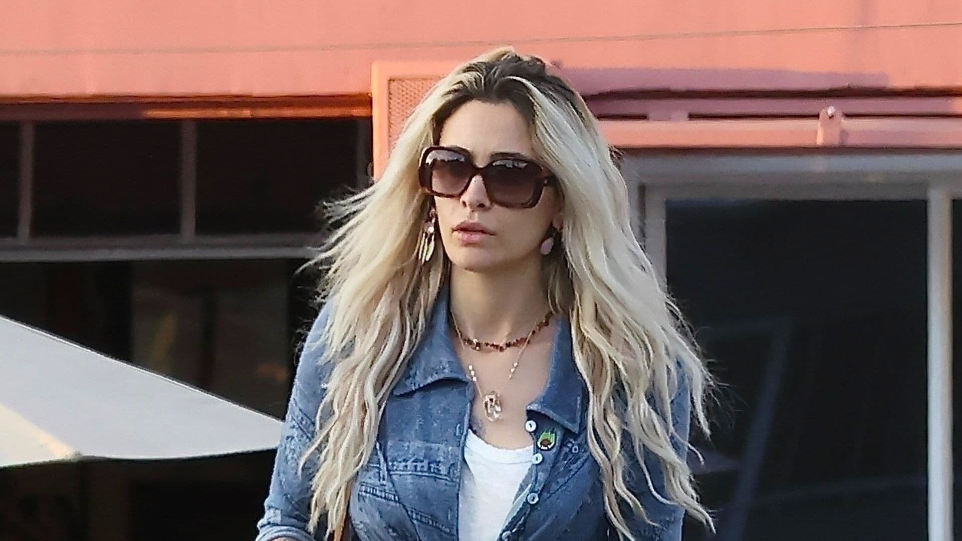 She keeps it boho in oversized shades and stacked jewelry for an easy L.A. afternoon. 