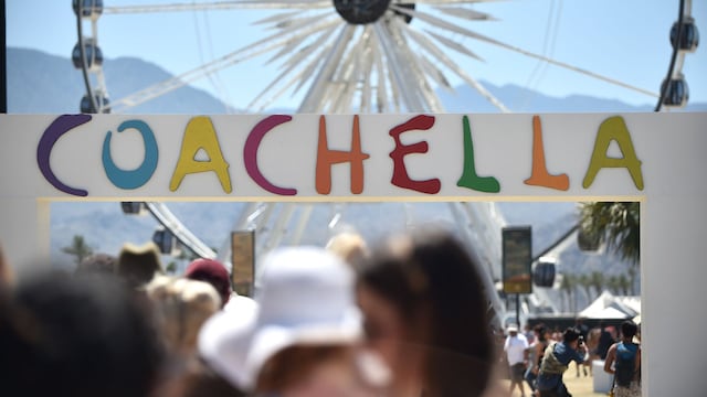INDIO, CA - APRIL 23:  Festivalgoers are seen near the Ferris Wheel during day 3 of the Coachella Valley Music And Arts Festival  (Photo by Emma McIntyre/Getty Images for Coachella) 