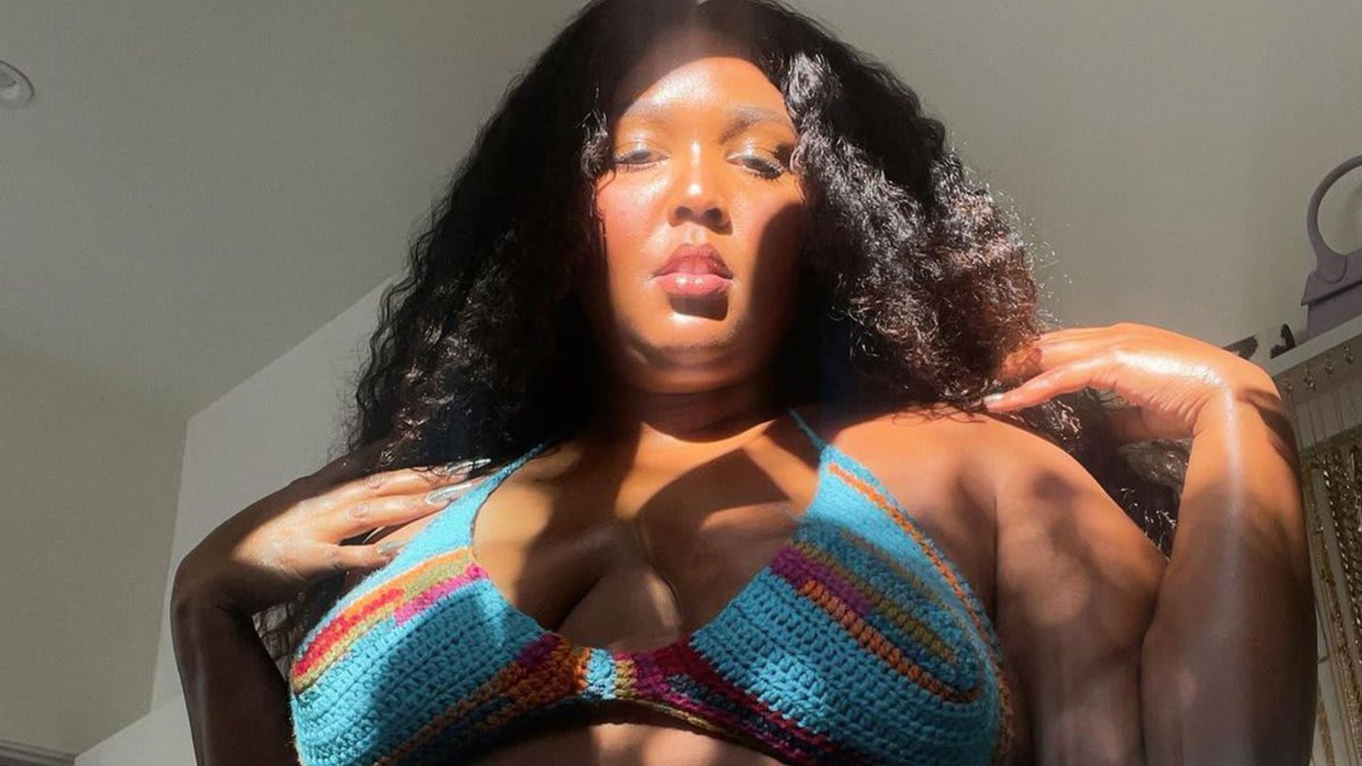 Lizzo screams summer wearing bikini top and jeans for night out in Los Angeles