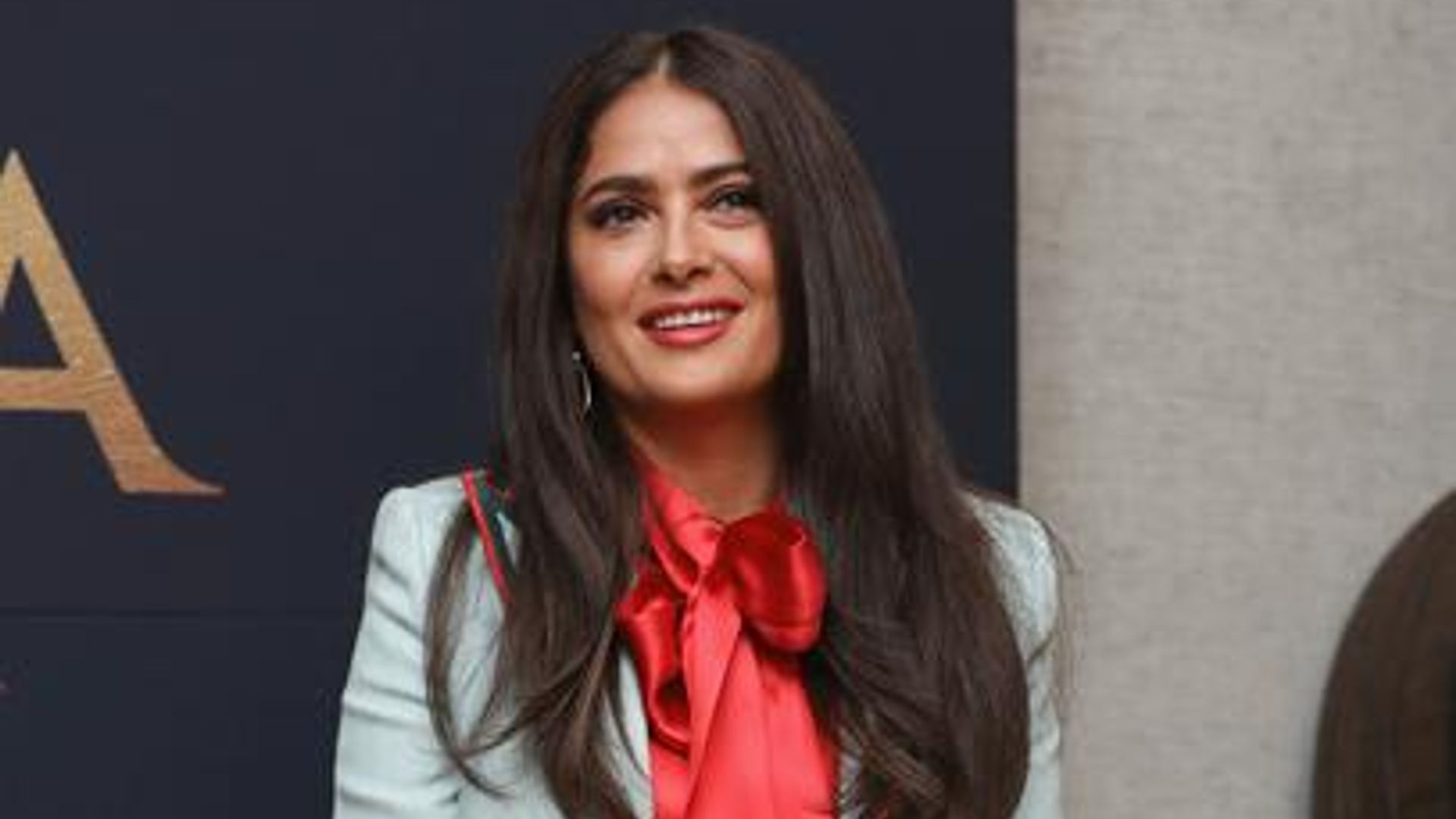 Salma Hayek channeled '70s fashion and wore the world's tallest platform shoes