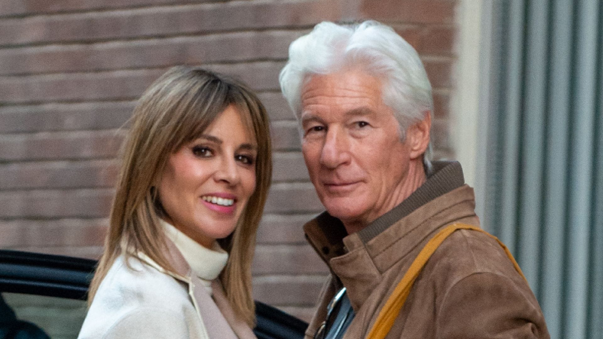 Richard Gere and Alejandra Silva share a sweet kiss at New York City premiere