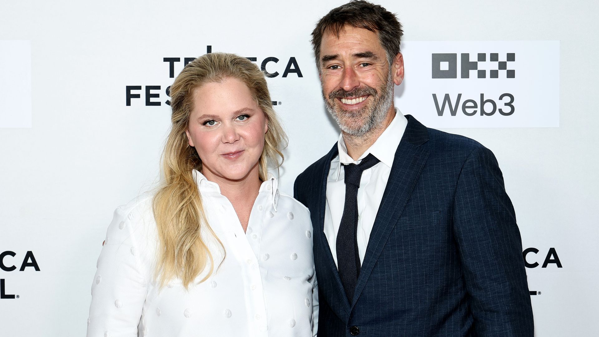 Amy Schumer and husband Chris Fischer divorcing after 7 years of marriage