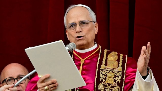Newly elected Pope Leo XIV, Robert Prevost addresses the crowd on the main central loggia balcony of the St Peter's Basilica for the first time 
