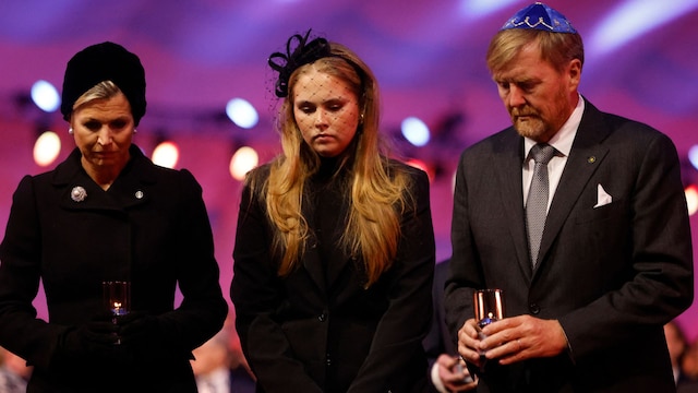 (LtoR) Queen Maxima of the Netherlands, Princess Catharina-Amalia of the Netherlands, Princess of Orange and King Willem-Alexander of the Netherlands place votive candles in front of the train car, the symbol of the event, to pay tribute to the victims during commemorations on the 80th anniversary of the liberation of the German Nazi concentration and extermination camp Auschwitz-Birkenau by the Red Army, in Oswiecim, Poland on January 27, 2025. (Photo by Wojtek RADWANSKI / AFP) (Photo by WOJTEK RADWANSKI/AFP via Getty Images)