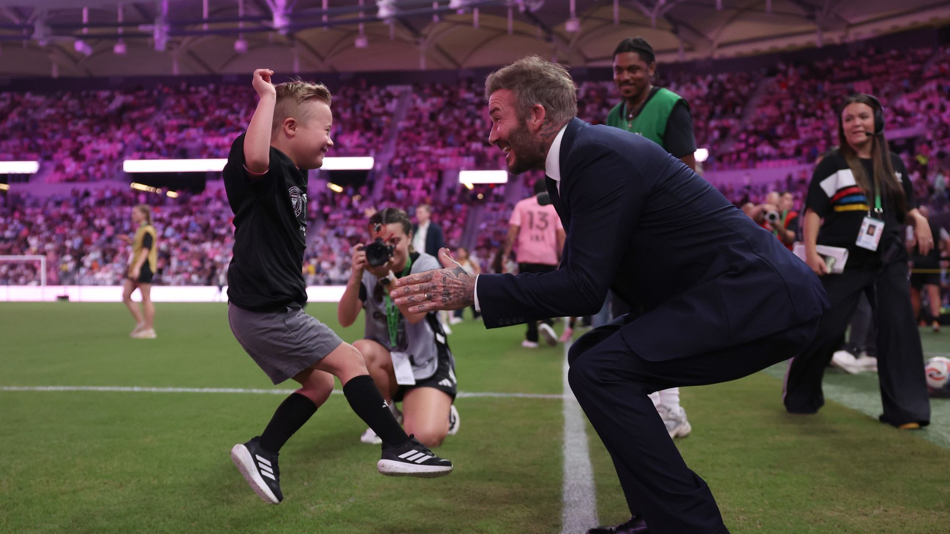 Sir David Beckham, of co-owner of Inter Miami, greets player escort prior to the MLS match