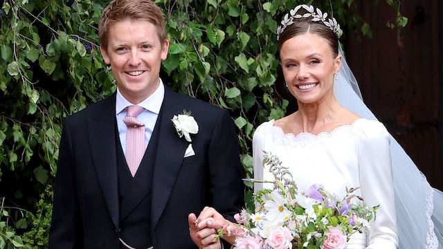 CHESTER, ENGLAND - JUNE 07: Hugh Grosvenor, Duke of Westminster and Olivia Grosvenor, Duchess of Westminster wave and smile to well-wishers after their wedding ceremony at Chester Cathedral on June 07, 2024 in Chester, England. (Photo by Chris Jackson/Getty Images)
