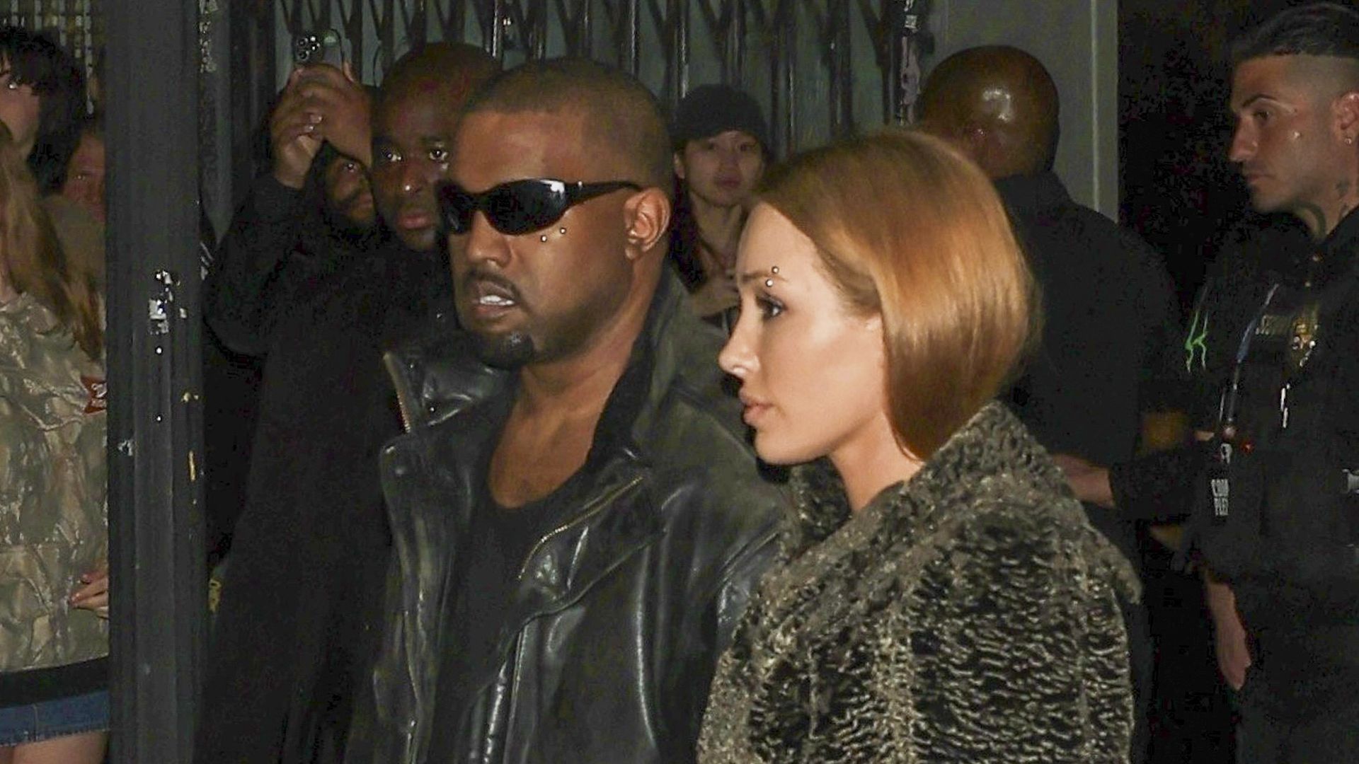  Ye kept things understated in an all-black ensemble, letting Bianca's statement style take center stage. 