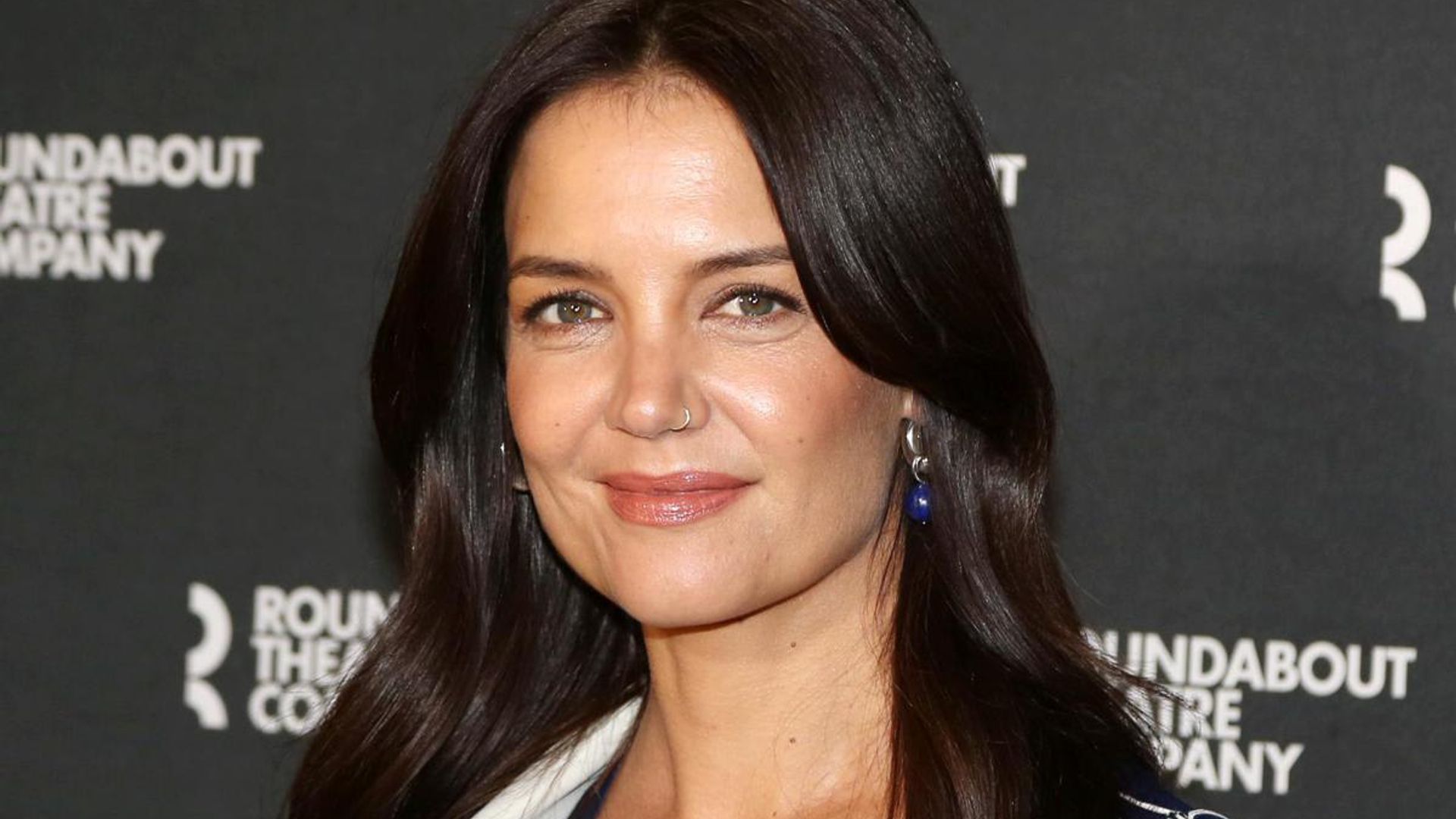 Katie Holmes looks stunning in vintage-inspired outfit and chunky gold hoops