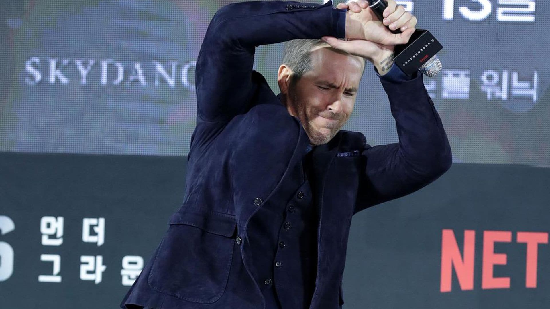 Ryan Reynolds falls and is nearly crushed by fans after barricade comes down in Brazil