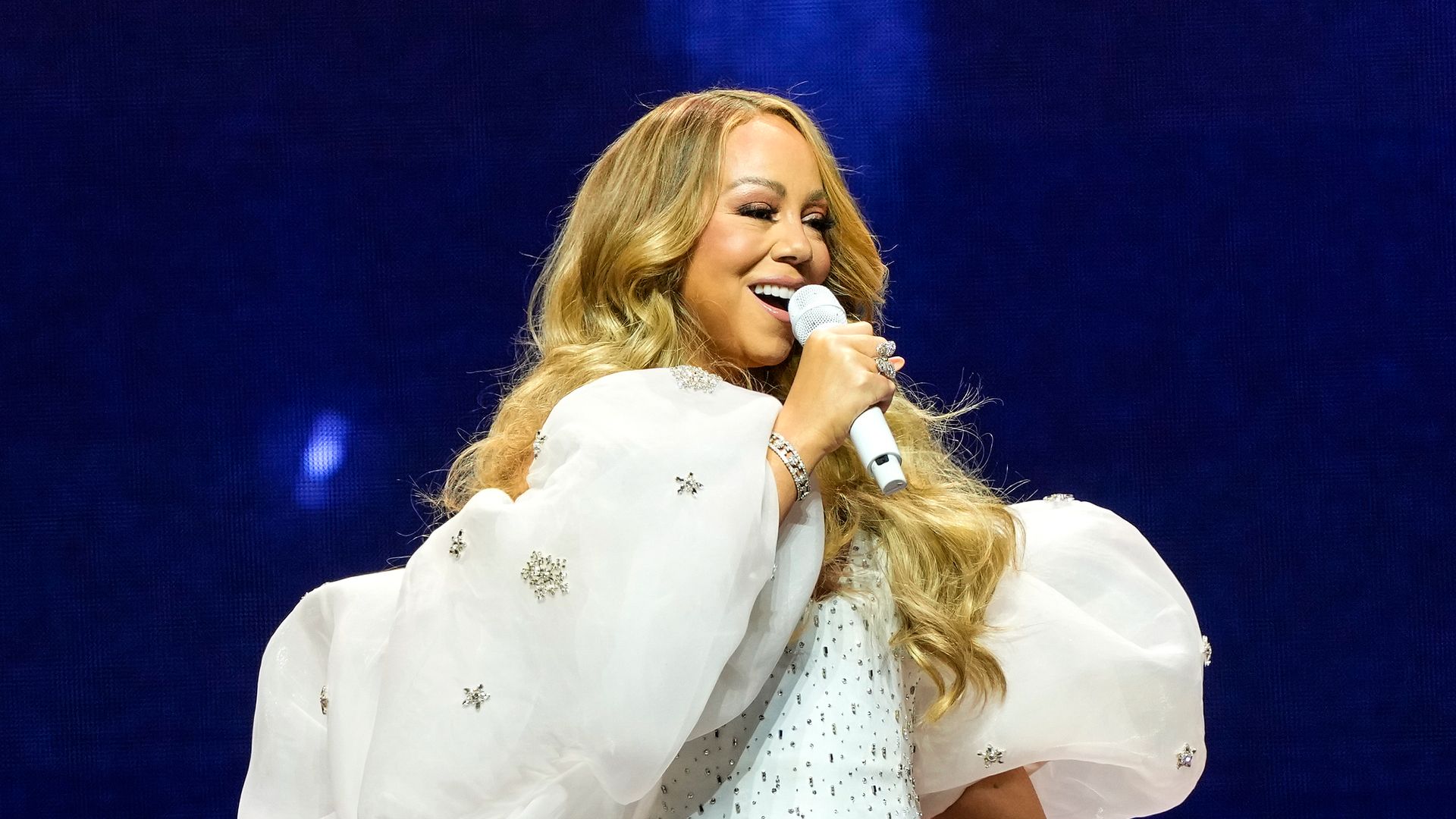 Mariah Carey stuns while showing off hourglass figure in new photos