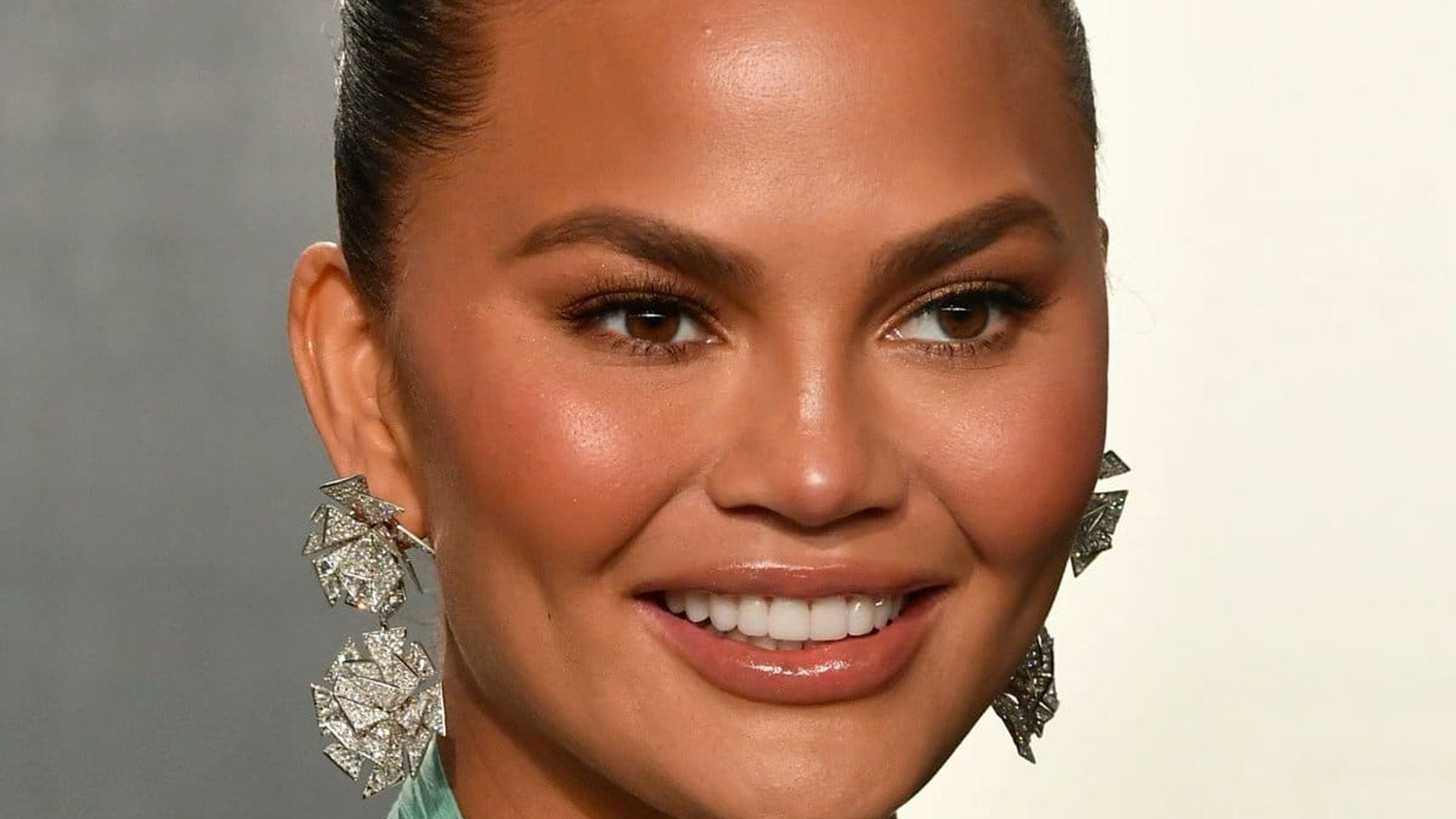 Chrissy Teigen shares the pics she used to get a modeling agent 15 years ago