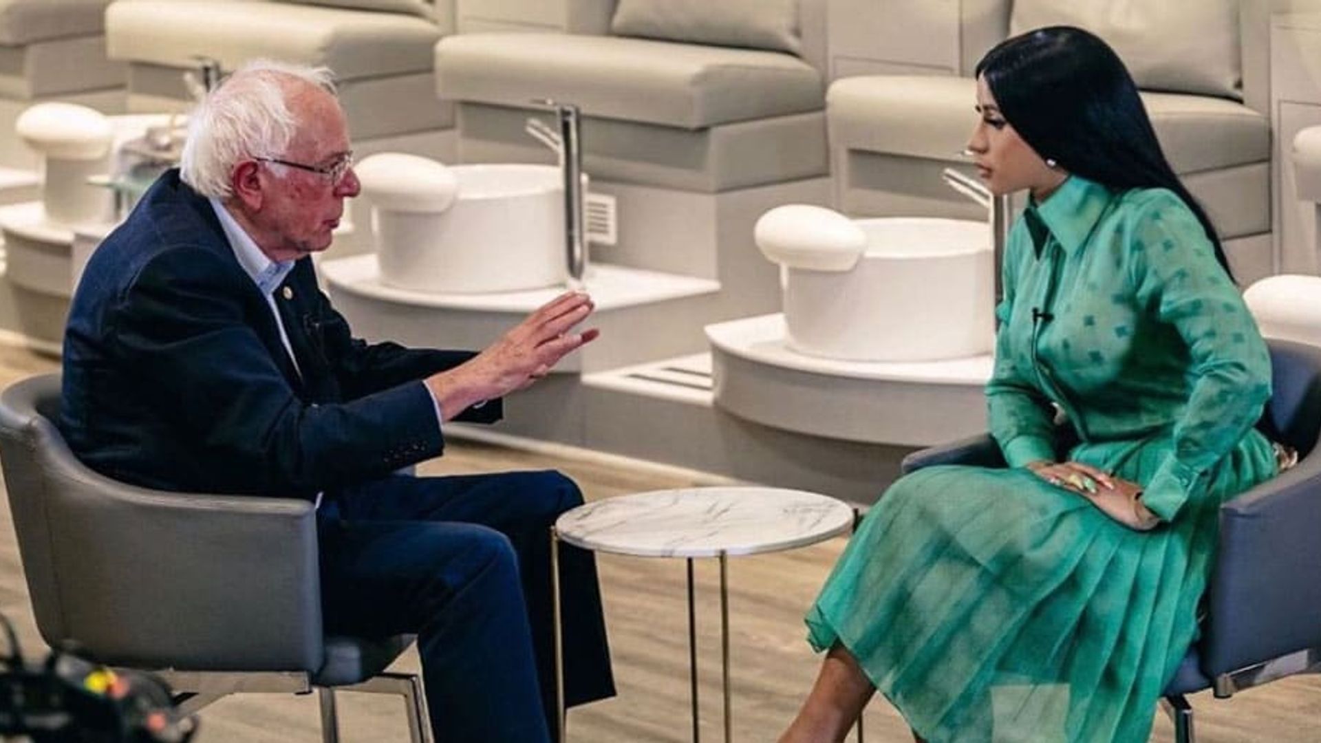 Cardi B talks her financial struggles as she grills Bernie Sanders in a nail salon