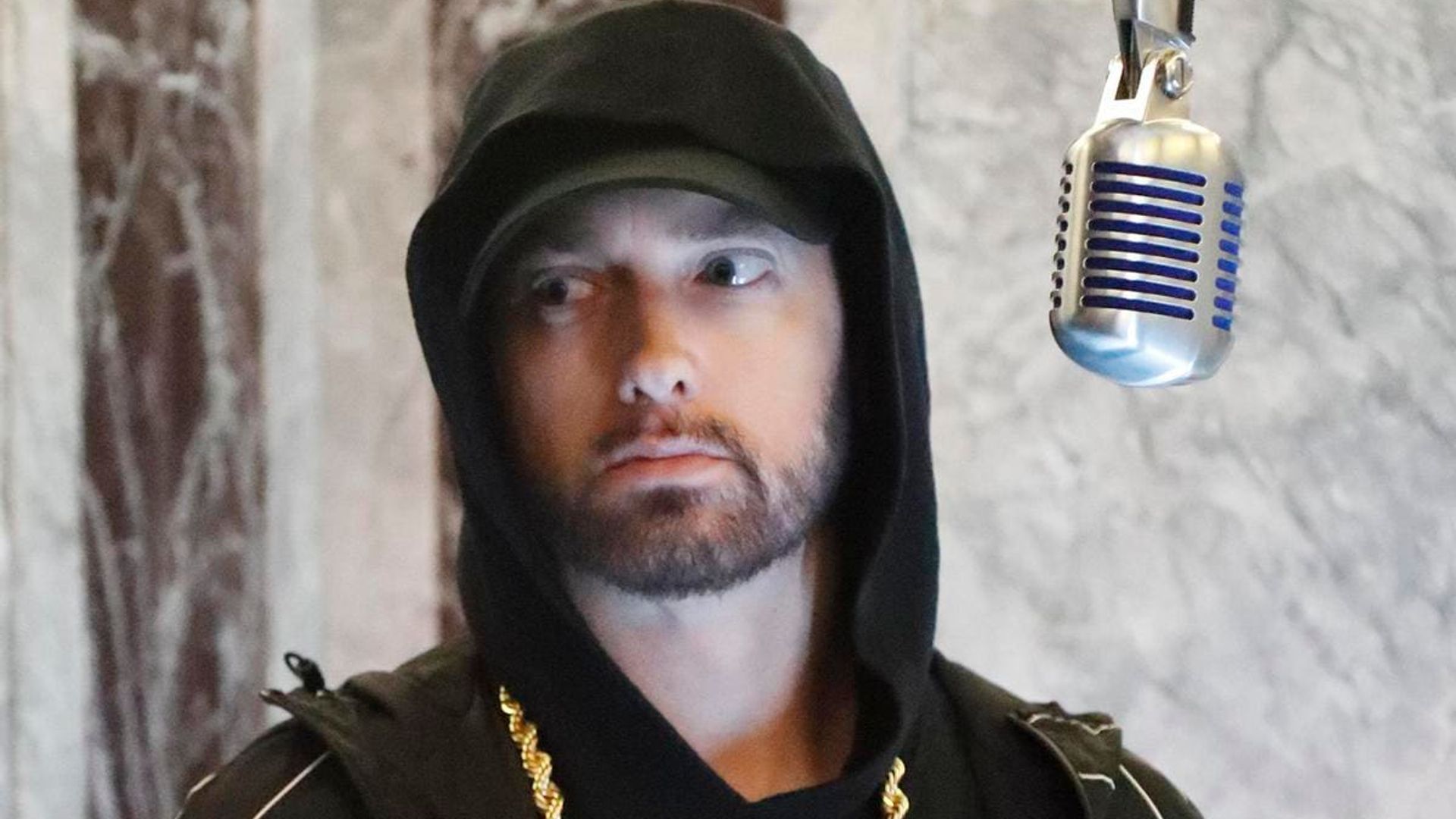 Eminem walked his adopted daughter Alaina down the aisle