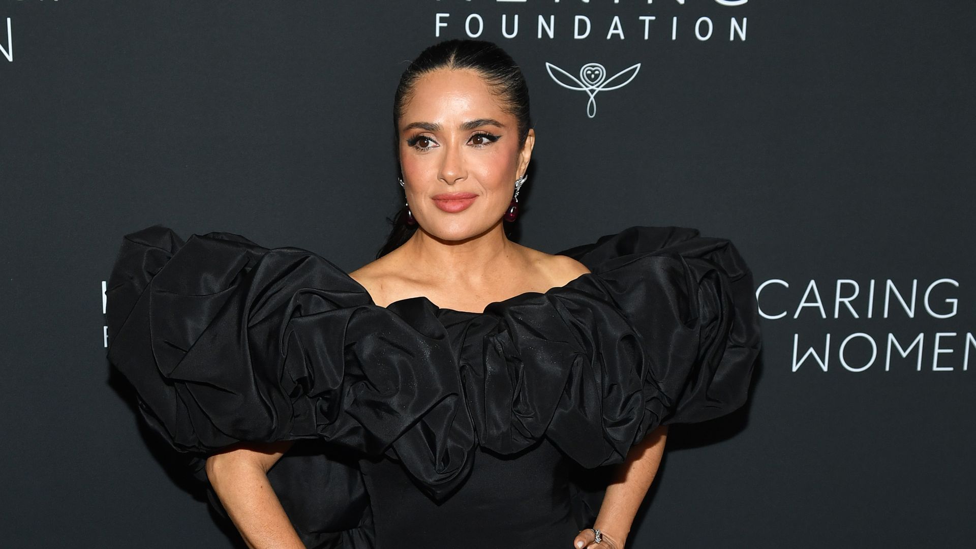Salma Hayek makes a stunning all-black NYFW entrance