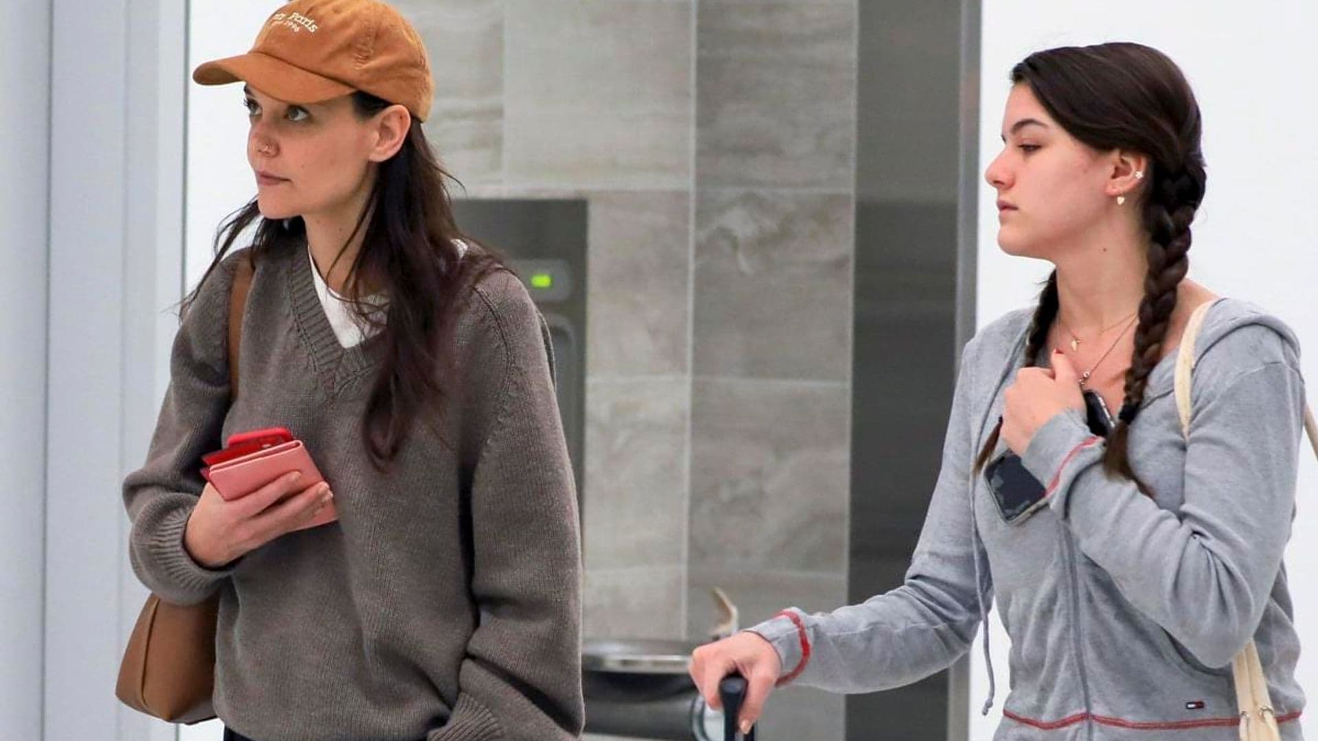 Katie Holmes and Suri Cruise spotted boarding a flight in Los Angeles