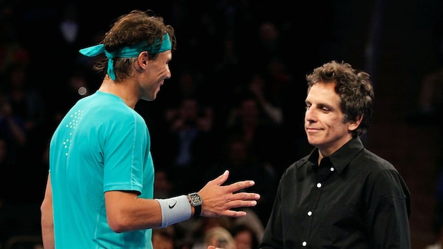 Ben Stiller comes out to play with Rafael Nadal in the second set against Juan del Potro of Argentina during the BNP Paribas Showdown at Madison Square Garden on March 4, 2013