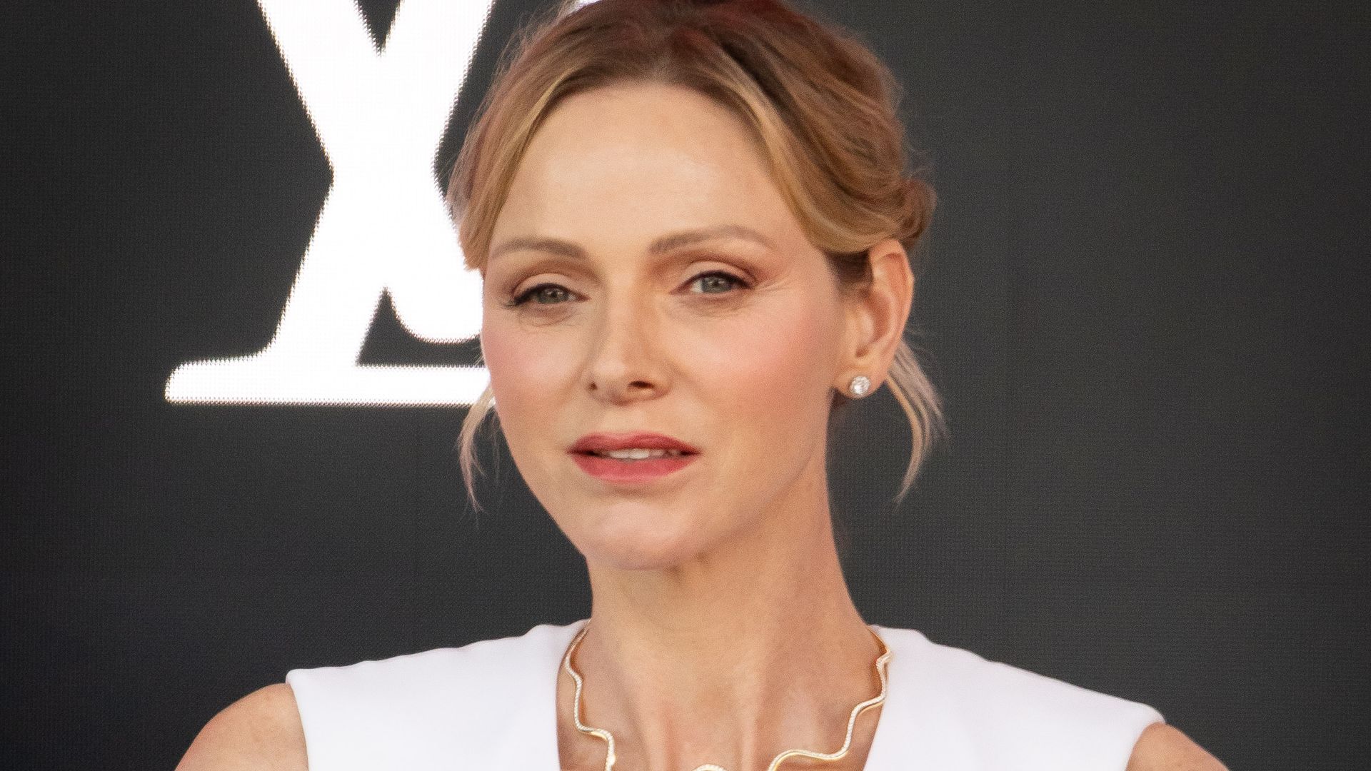 Princess Charlene steps out in chic tweed dress and nude pumps for Monaco engagement