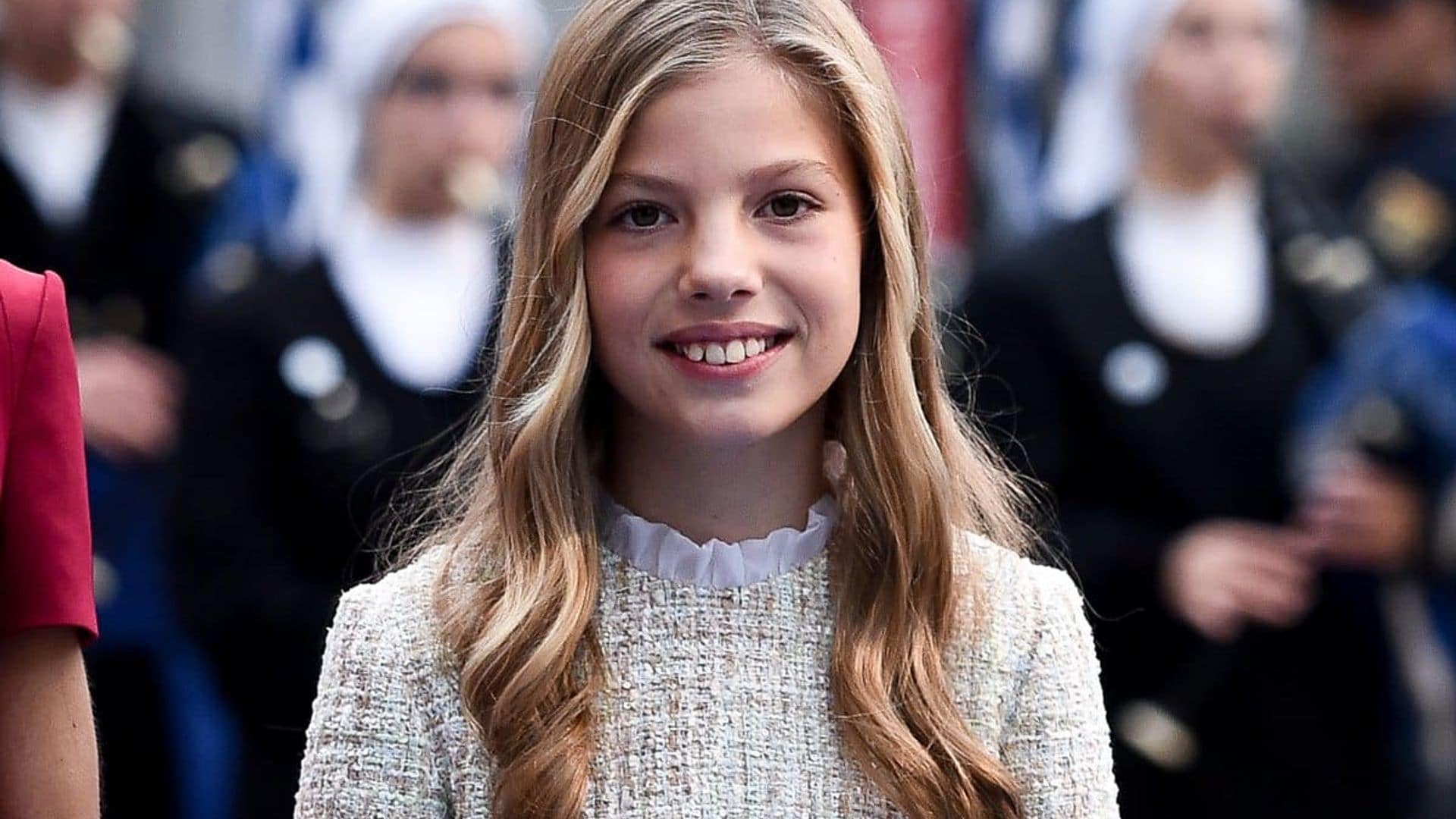 Spanish Princess rocks stylish top knot in Barcelona
