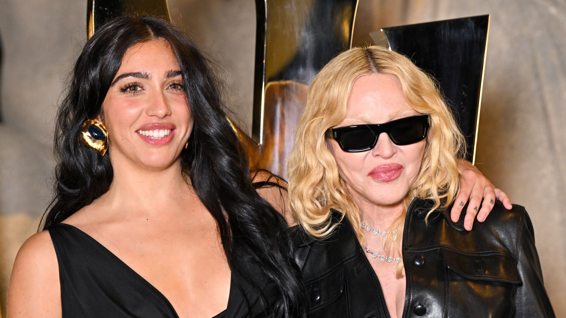 Lourdes Leon and Madonna attend the Saint Laurent Womenswear Spring/Summer 2026 show as part of Paris Fashion Week on September 29, 2025 in Paris, France. (Photo by Stephane Cardinale - Corbis/Corbis via Getty Images)