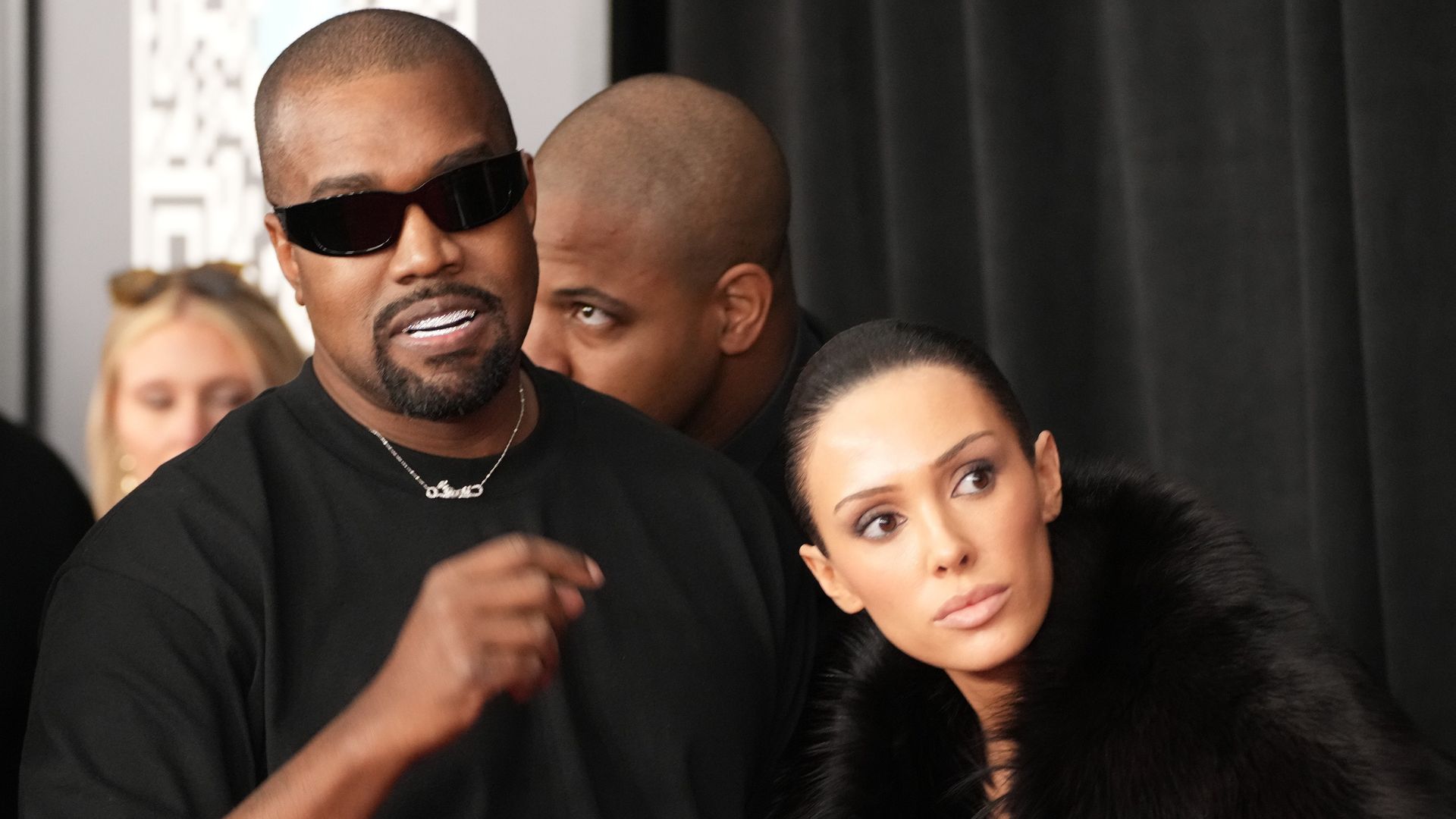 Bianca Censori and Kanye West wear matching black and white for goddaughter's graduation
