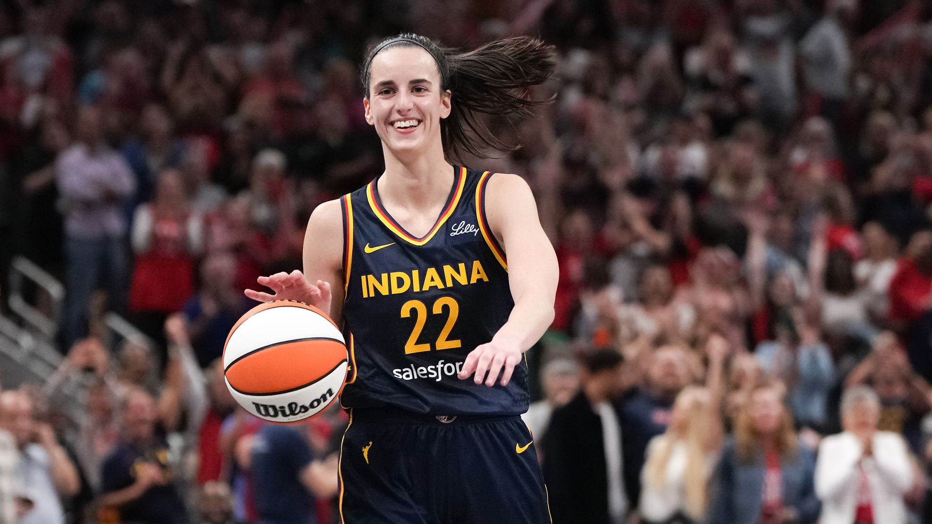  Caitlin Clark #22 of the Indiana Fever celebrates after recording a triple-double in the fourth quarter against the Los Angeles Sparks at Gainbridge Fieldhouse on September 04, 2024 in Indianapolis, Indiana. NOTE TO USER: User expressly acknowledges and agrees that, by downloading and or using this photograph, User is consenting to the terms and conditions of the Getty Images License Agreement. (Photo by Dylan Buell/Getty Images)