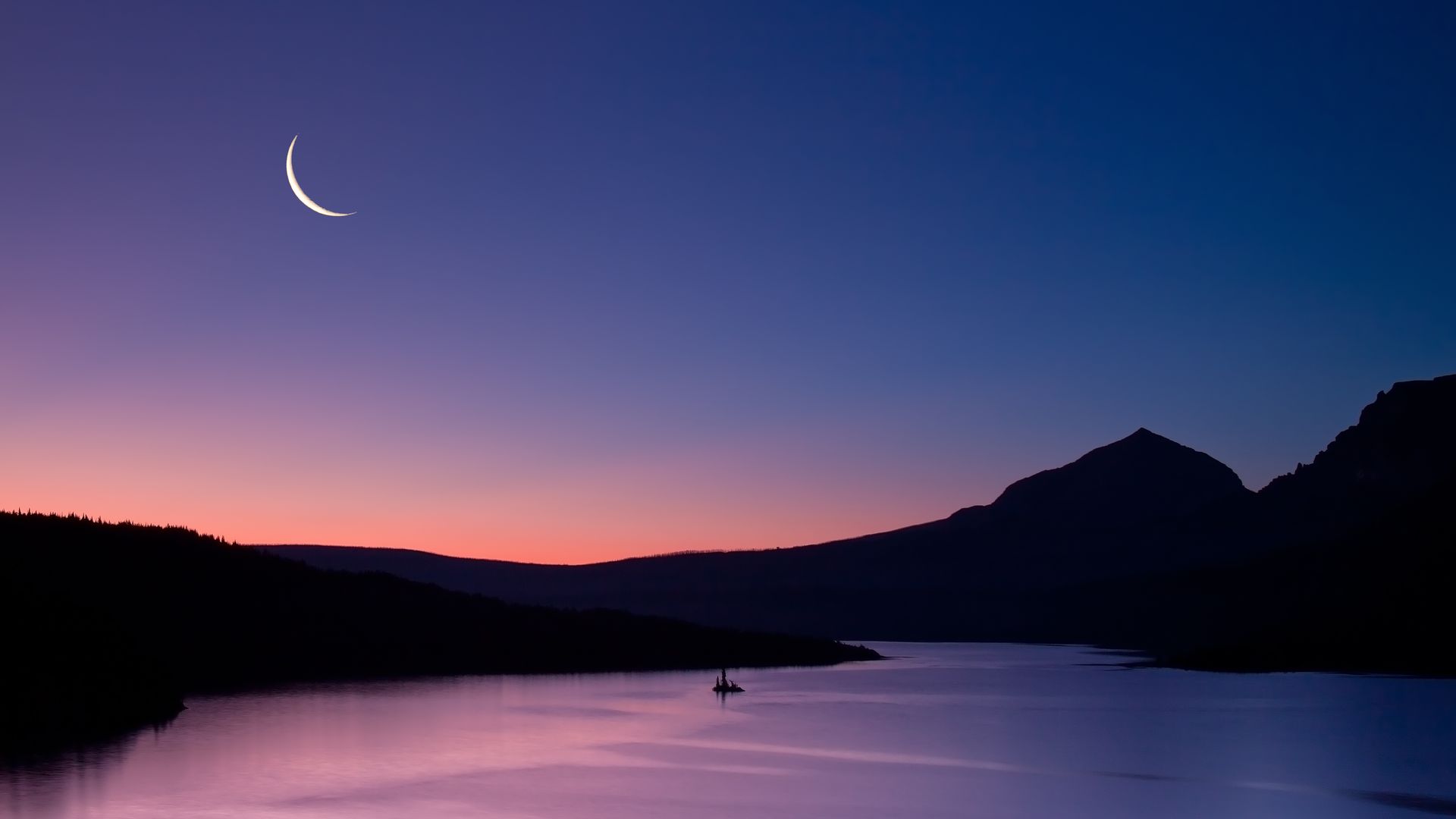 This beautiful, bright crescent moon shows the glow of dawn approaching.