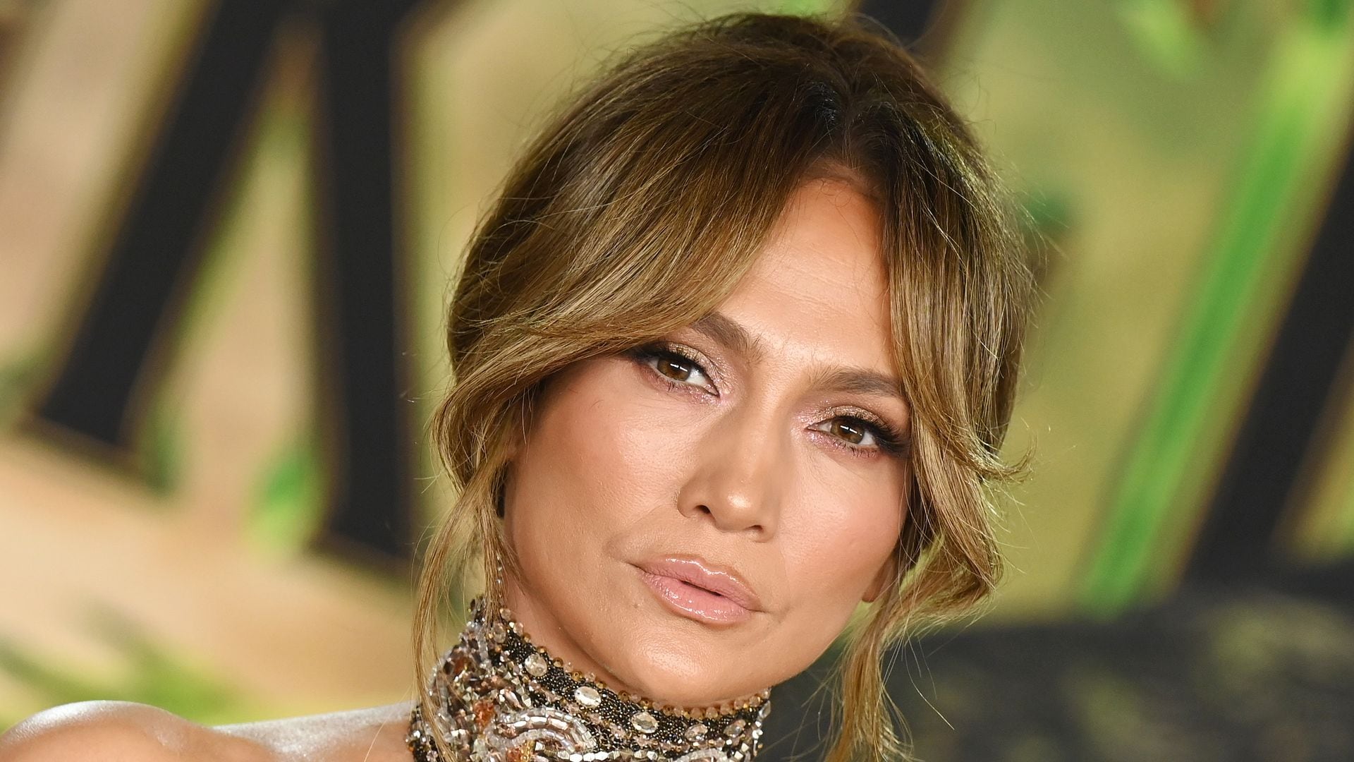 JLo gets choked up explaining canceled tour to supportive fan