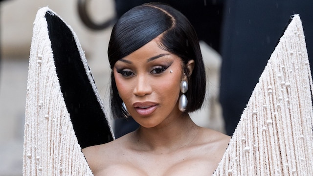 Cardi B stole the show in Paris with two looks, including blue minidress and corset gown