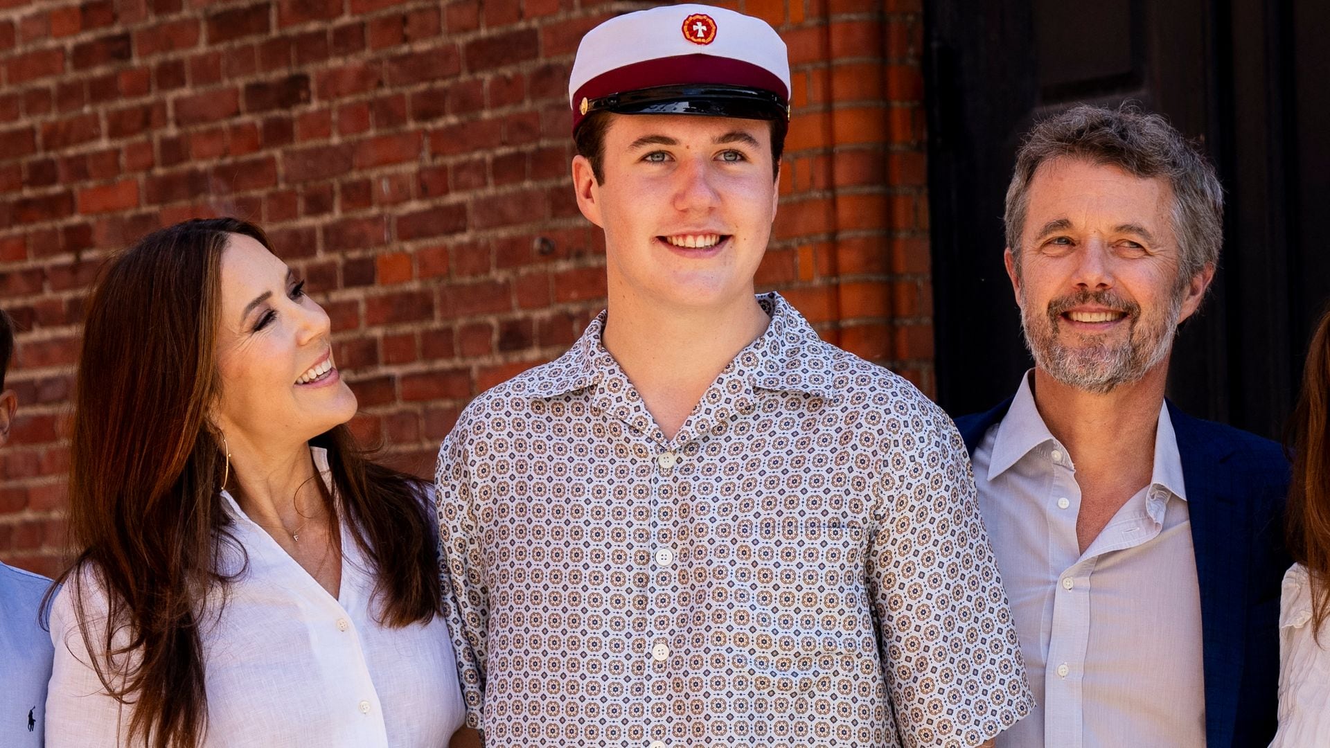 King and Queen beam with pride on son's big day