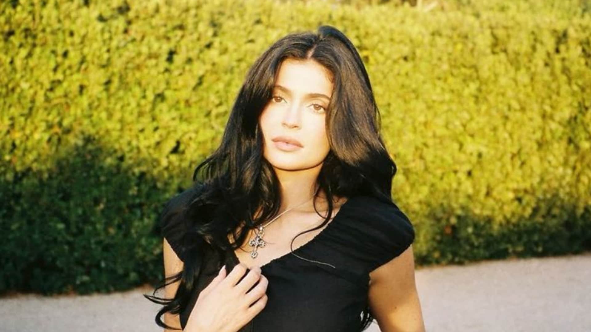 Kylie Jenner poses in see-through lace and low-rise jeans in intimate fall look