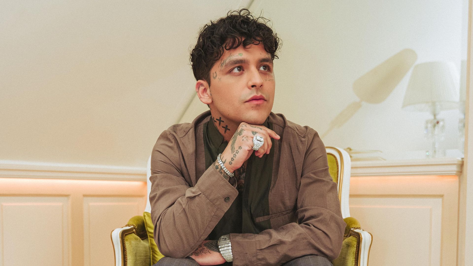 Christian Nodal poses in head-to-toe Dior at Paris Fashion Week [PHOTOS]