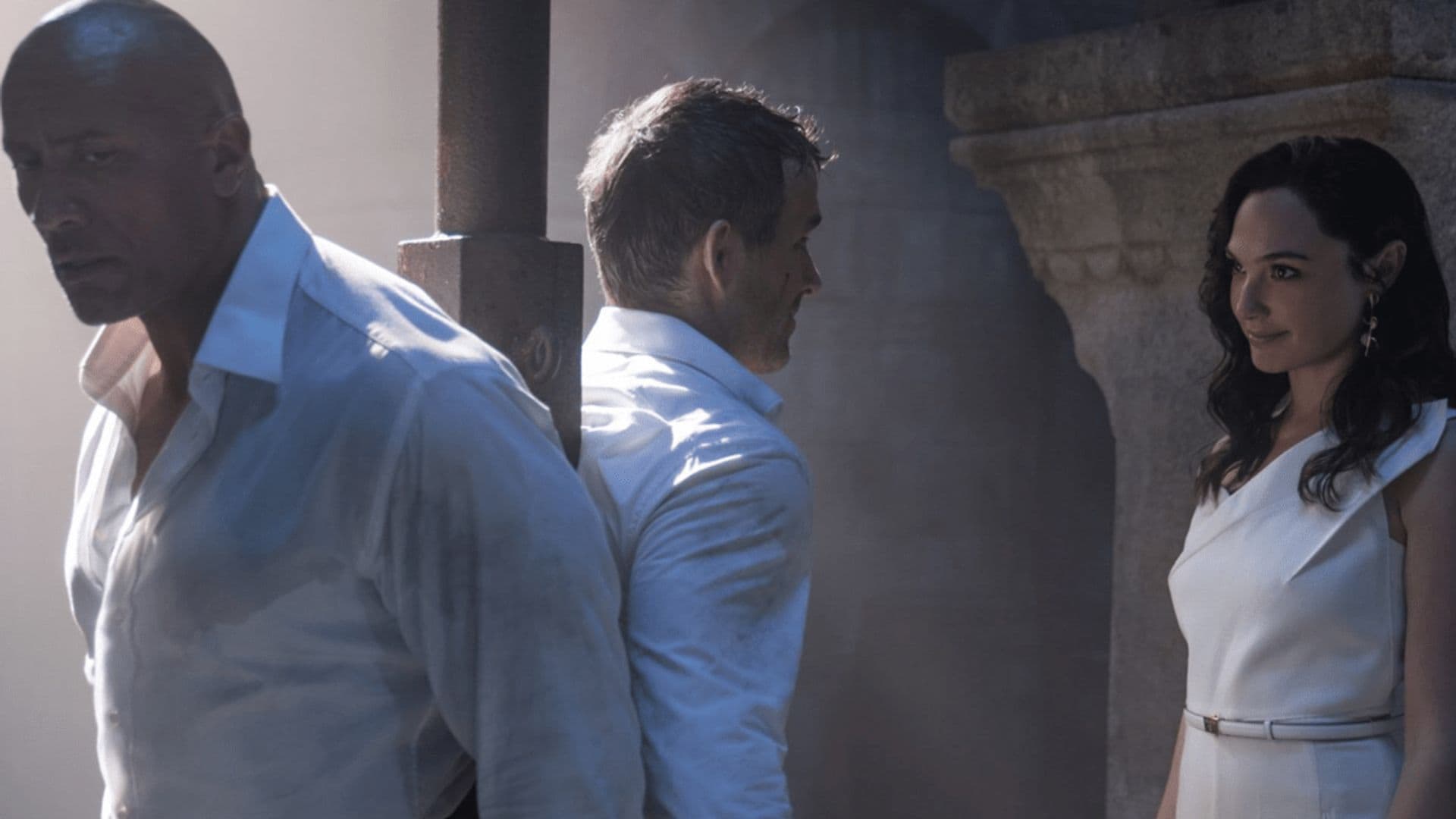 Ryan Reynolds and Dwayne Johnson team up against Gal Gadot in ‘Red Notice’ trailer