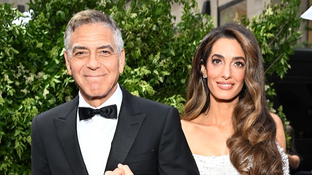 Amal Clooney turns heads in tight-high slit dress during special night out with George Clooney