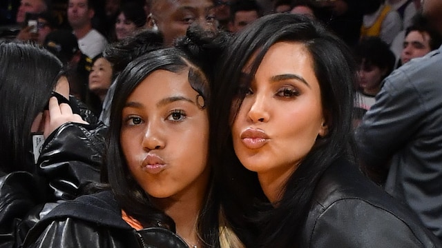 Kim Kardashian (R) and North West attend a basketball game between the Los Angeles Lakers and the Golden State Warriors at Crypto.com Arena on April 09, 2024 in Los Angeles, California.