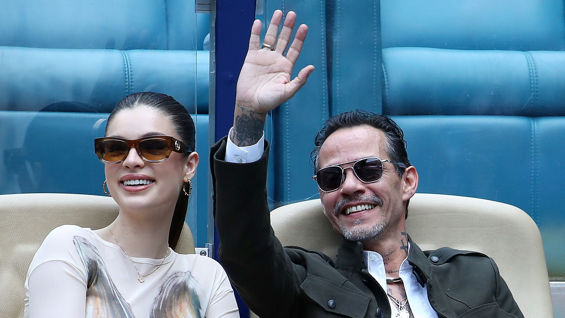 Marc Anthony and his wife Nadia Ferreira attend the match between Novak Djokovic of Serbia and Camilo Ugo Carabelli of Argentina during Day 6 of the Miami Open at Hard Rock Stadium on March 23, 2025 in Miami Gardens, Florida. (Photo by Leonardo Fernandez/Getty Images)