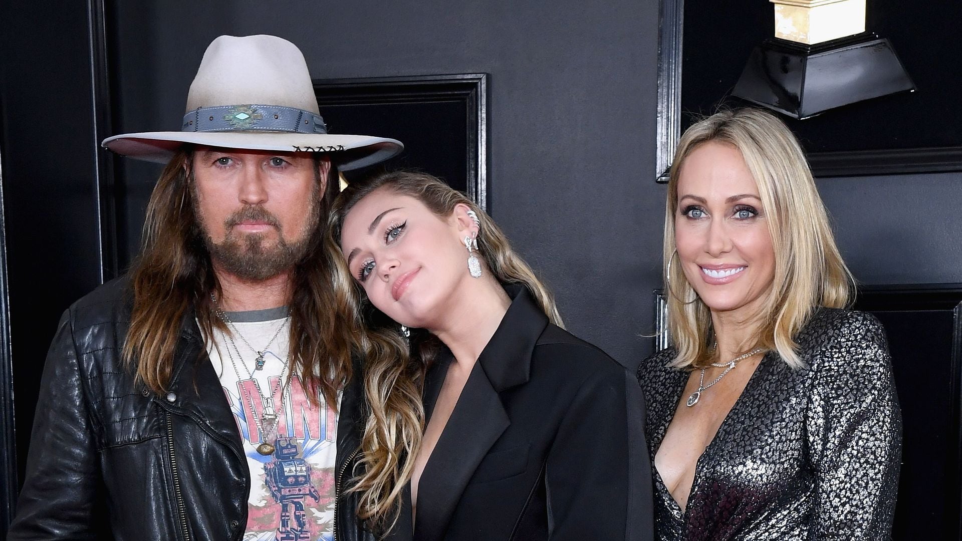 LOS ANGELES, CA - FEBRUARY 10: (L-R) Billy Ray Cyrus, Miley Cyrus, and Tish Cyrus attend the 61st Annual GRAMMY Awards at Staples Center on February 10, 2019 in Los Angeles, California. (Photo by Amy Sussman/FilmMagic)