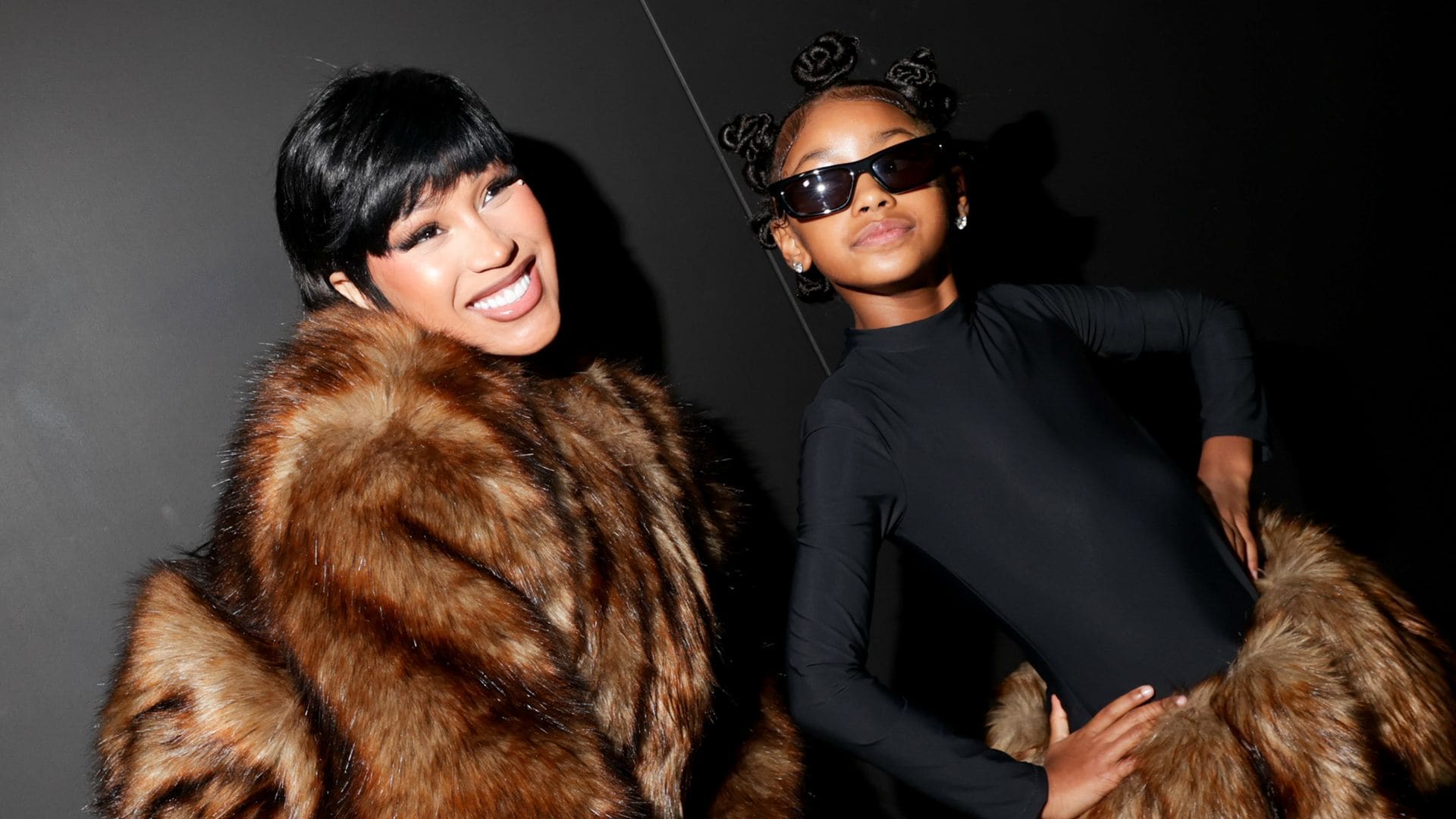 Cardi B and Daughter Kulture twin in mother–daughter matching fur outfits at New York Fashion Week