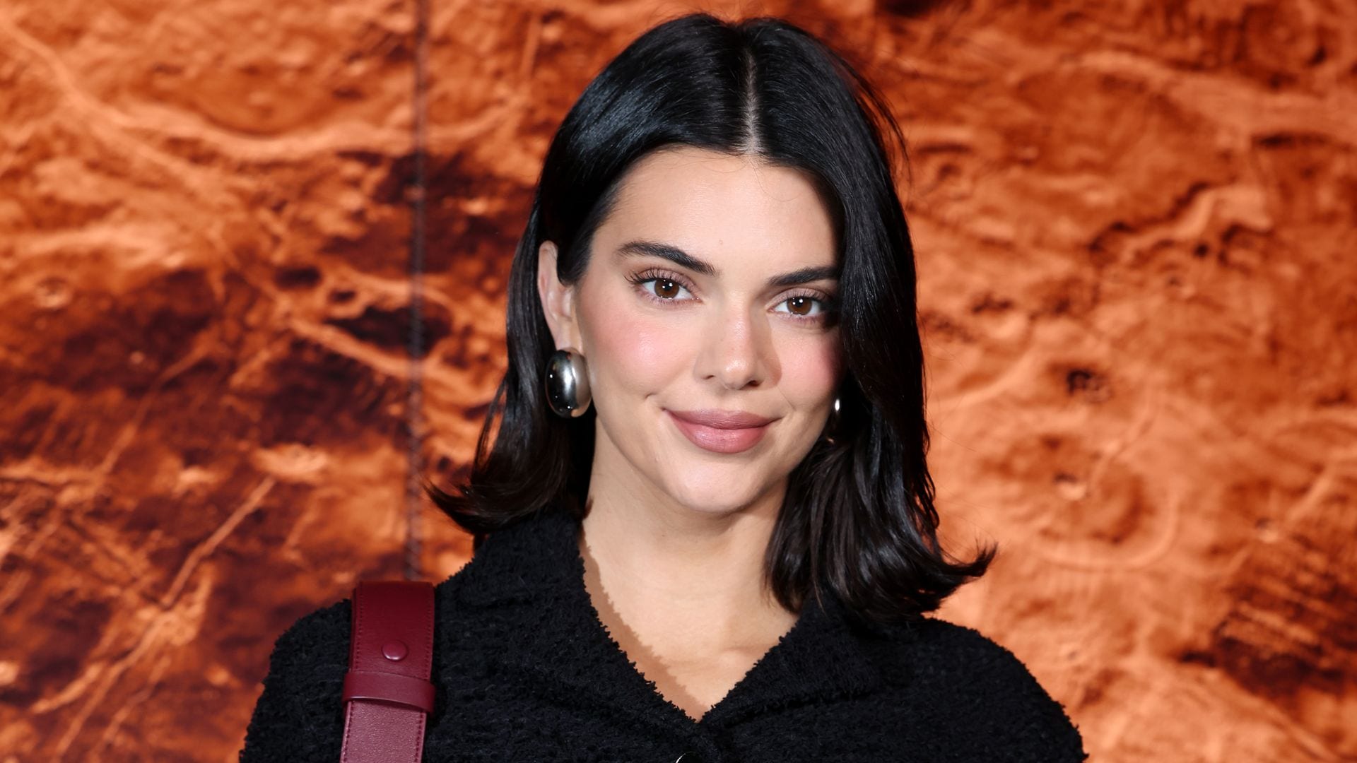 Kendall Jenner sunbathes in high-cut swimsuit and stuns in sleek cutout dress in Super Bowl ad