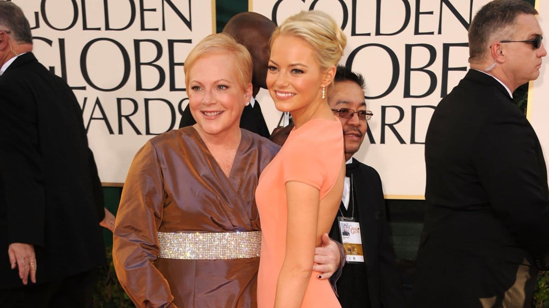 Emma Stone and her mom sat next to a very famous couple at her first Golden Globes
