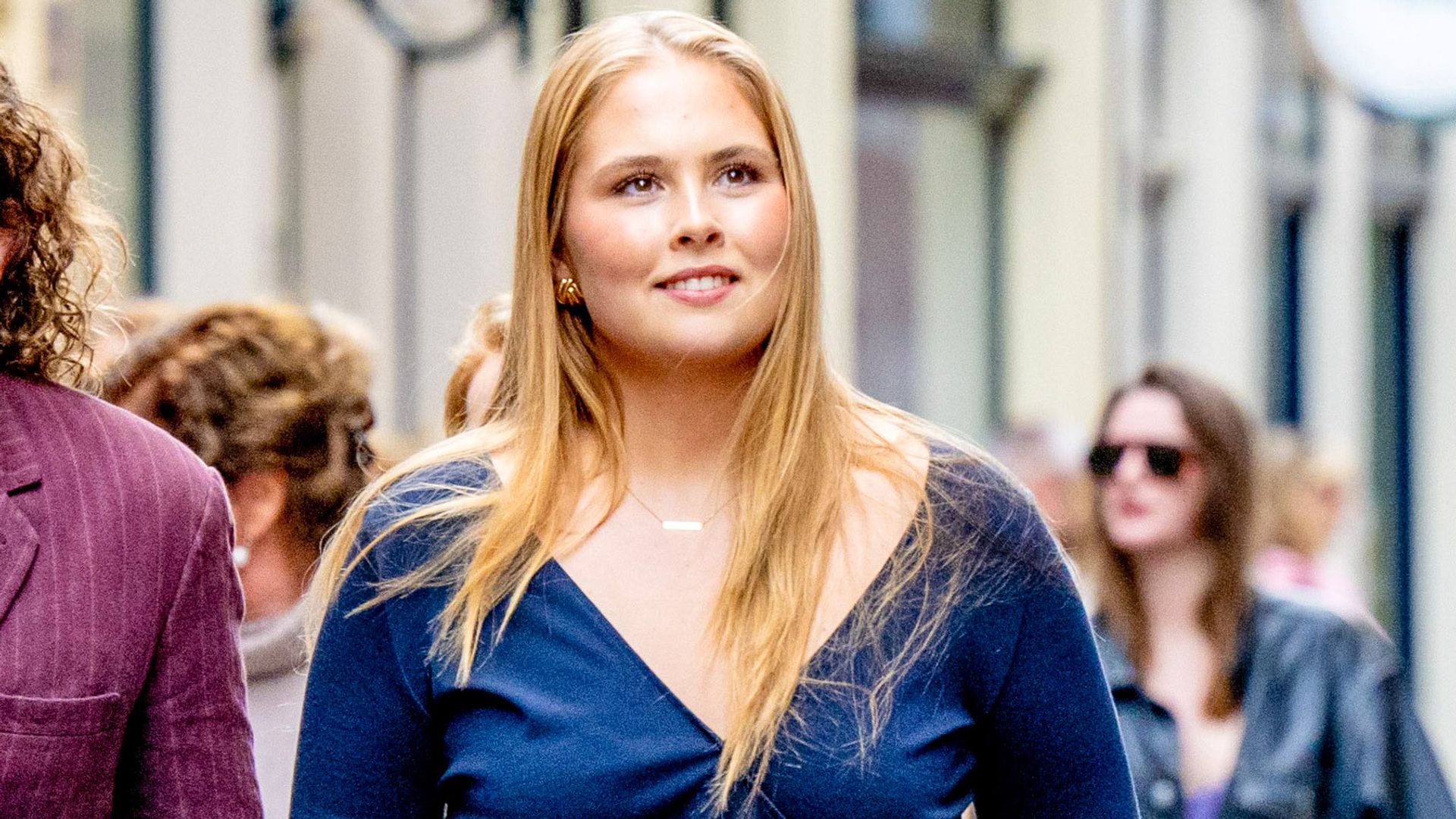 Princess Amalia’s timeless blue look and soft-glam beauty signal a modern royal style shift