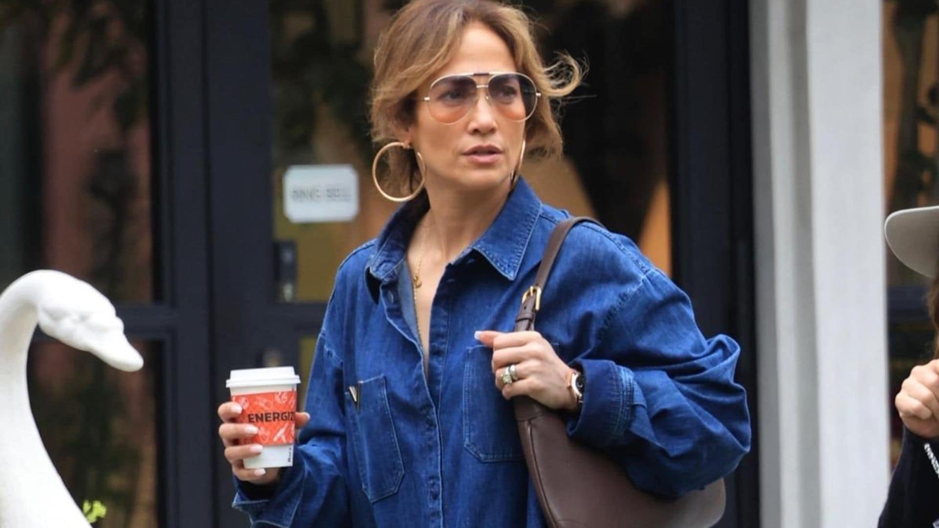 Jennifer Lopez shows off her street style in daring denim dress with high leg slits
